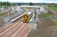 ScotRail 158738 held at Shawfair station platform 1 on 15 June on a crew training trip returning from Tweedbank.<br><br>[John Furnevel 15/06/2015]