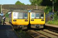 Blackpool South to Colne meets Colne to Blackpool South! 142005 and 142055 call at Pleasington station on 10 June 2015. Pleasington is a request stop but both services had passengers to drop off and collect on this occasion.<br><br>[John McIntyre 10/06/2015]