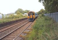 Northern 158908 approaching Church and Oswaldtwistle non-stop on 13 June 2015 with a York to Blackpool service. The platforms have been reduced in length here by approximately 50% over the years - although you could say that the unused parts have been put out to grass!<br><br>[John McIntyre 13/06/2015]