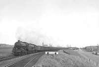 B1 61323 pilots B12 61511 out of the yards at Fraserburgh on 13 July 1950 with an express fish train. <br><br>[G H Robin collection by courtesy of the Mitchell Library, Glasgow 13/07/1950]