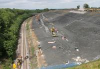 The massive clearance works continue following the landslip in Harbury cutting earlier this year. This photograph, taken from above the north portal of the short Harbury Tunnel during a Sunday line possession on 14 June 2015, shows the extent of earth removal that has taken place and makes an interesting comparison with the scene in September 2014 [see image 48778]. <br><br>[Mark Bartlett 14/06/2015]