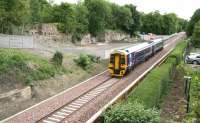 A route training trip over the Borders Railway heading north from Tweedbank towards Newcraighall on 19 June 2015. ScotRail 158731 is approaching the former Glenesk Junction, passing the remains of the long closed Glenesk Colliery on the left.<br><br>[John Furnevel 19/06/2015]