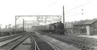 Gresley V3 67626 passing the former Stobcross shed on 14 July 1961 with a Helensburgh Central - Bridgeton Central train. The two road dead end shed,  which stood in the triangle formed by the railway and Kelvinhaugh Street to the north, had closed in October 1950, at which time it was a sub to 65D Dawsholm. <br><br>[G H Robin collection by courtesy of the Mitchell Library, Glasgow 14/07/1961]