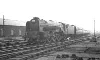 Neville Hill A1 60134 <I>Foxhunter</I> comes off the Settle and Carlisle line on 3 August 1963 with the summer Saturday 6.29am Birmingham New Street - Gourock. The Pacific had brought the train north from Leeds City.<br><br>[K A Gray 03/08/1963]