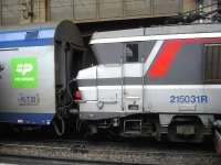 Despite new Alstom Regiolis EMUs coming on line [see image 50506] to supplement older EMUs on the Picardie route services, there are still loco hauled services running alongside the EMUs. Push-pull modified loco 215031R is at the south end of a rake of coaches stabled in Gare du Nord station on the morning of 26 February. <br><br>[David Pesterfield 26/02/2015]