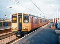 Strathclyde Red liveried 314208 pulls into Newton station in September 1997 with a Dalmuir service.<br><br>[David Panton /09/1997]