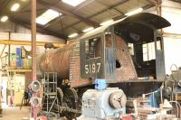 Former US Army Transportation Corps class S160 2-8-0 heavy freight locomotive no 5197 under extensive repair at Cheddleton on the Churnet Valley Railway in June 2015. <br><br>[Peter Todd 20/06/2015]