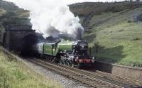 <h4><a href='/locations/B/Blea_Moor_Tunnel'>Blea Moor Tunnel</a></h4><p><small><a href='/companies/S/Settle_and_Carlisle_Line_Midland_Railway'>Settle and Carlisle Line (Midland Railway)</a></small></p><p>'The Lord Bishop' memorial train leaves the north portal of Blea Moor Tunnel on 30 September 1978 behind 4472 <I>Flying Scotsman</I>.  58/132</p><p>30/09/1978<br><small><a href='/contributors/John_Robin'>John Robin</a></small></p>