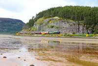 In-between some very heavy showers 60163 <I>Tornado</I> skirts the edge of Loch Fleet, just north of The Mound, on 21 June 2015 with 'The Seaforth Highlander' on its way north to Brora. <br><br>[John Gray 21/06/2015]