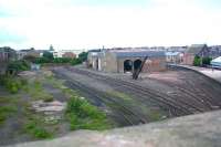 The disused goods yard and shed on the west side of Arbroath station, seen looking north from Keptie Street in August 2006. The buildings have since been demolished [see image 21325].<br><br>[John Furnevel 09/08/2006]