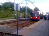 Sheffield Supertram 101 in sylvan surroundings at Sheffield Station and Hallam University tram stop on 28 June 2015.<br><br>[John Yellowlees 28/06/2015]