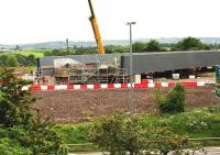 Grabshot from a passing train showing the eastern end of the new Bargeddie bridge on 29th June 2015.<br><br>[Colin McDonald 29/06/2015]