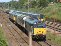 DCR 31601 hauled 47643, 20020, 26038 and 37025 south at Farington on 29 June 2015. Quite a collection of classic traction although examples of each type, less the Class 26, can be seen working on the mainline over 40 years after they were built.<br><br>[John McIntyre 29/06/2015]