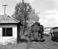 CKD-bullt 760mm gauge 0-6-0T No. 25-30 returns light engine from the washery at Oskova to pick up another rake of loaded wagons from the yard in the Autumn of 2014. The wagons on the right comprise a rake which has just been unloaded and are probably already on the move behind a class 740 diesel, bound for the loading point at Turija.		<br><br>[Bill Jamieson 28/09/2014]