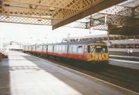 In September 1997 303061 pulls into Paisley Gilmour Street with a Wemyss Bay service.<br><br>[David Panton 17/07/1997]