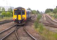 East Midlands Trains 156411 leans into the curve as it approaches Leicester on 19 June 2015 to form the 1526 'Flying Dutchman' service to Lincoln [see image 51810].<br><br>[Ken Strachan 19/06/2015]