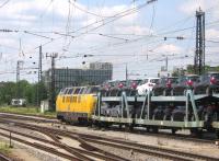 Regensburg on the Passau-Nuremberg main line in south east Bavaria sees a steady succession of national and international freight trains, operated by a wide range of rail hauliers. Here a lengthy car train pulls away after a short halt at Regensburg Hauptbahnhof on 17th June, hauled by vintage ex-Deutsche Bahn motive power in the shape of Class 221 106-8 of the Potsdam-based EGP company. The Class 221 - reminiscent of the British 'Warship' design - is a post-1962 derivative of the 1950s' Class 220 (originally V200.0), DB's first series-production diesel-hydraulic express loco [with thanks to Bill Jamieson].<br><br>[David Spaven 17/06/2015]