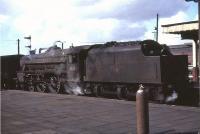 Black 5 45435 brings a northbound freight through Carnforth station on 1 June 1968.<br><br>[John Robin 01/06/1968]