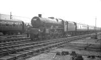 Approaching Carlisle from the south on 3 August 1963 is the 8.50am summer Saturday Blackpool Central - Glasgow Central. Locomotive in charge is Blackpool based Jubilee no 45574 <I>India</I>.<br><br>[K A Gray 03/08/1963]