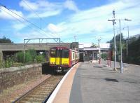 A Neilston - Glasgow Central train calls at Pollokshields East on a fine summer morning in August 2006. Platform view looking north towards Albert Drive.<br><br>[John Furnevel 11/08/2006]