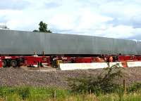 The wheeled vehicles in place for lifting and moving the completed structure on 8 July. The work to move the bridge has now commenced. <br>
<br>
<br><br>[Colin McDonald 08/07/2015]