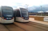 Edinburgh Trams pass under a heavy sky at Murrayfield Stadium on 12 July.<br><br>[John Yellowlees 12/07/2015]