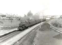A train from Glasgow Central destined for Patterton about to enter Muirend station on 29 April 1960. The locomotive is Polmadie's Fairburn 2-6-4T 42055. Note the tidy coal yard and broom!<br><br>[G H Robin collection by courtesy of the Mitchell Library, Glasgow 29/04/1960]