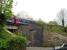 A First Great Western HST, on the slightly late 15.55 departure to Paddington - 14.53 ex Exeter St. David, stands across the bridge carrying the present single line over the A362 Wallbridge, beyond the north end of Frome station, on 8 May 2015. The leading power car is visible to right of a bridge abutment which shows an infilled area where a second track once crossed the road.<br><br>[David Pesterfield 08/05/2015]