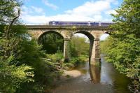 Shortly after leaving Larbert on 15 May 2015 the 1158 Dunblane - Edinburgh crosses the viaduct over the River Carron.  <br><br>[John Furnevel 15/05/2015]