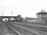 After running through Crosshouse station, Caley <I>Jumbo</I> 57353 is about to pass Crosshouse Junction signal box on 6 May 1953 with empties from the Dalry direction. [See image 45840] <br><br>[G H Robin collection by courtesy of the Mitchell Library, Glasgow 06/05/1953]