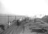 Trains passing on the WCML just south of the former Strawfrank Junction on 29 June 1963. The northbound train is hauled by Carstairs based Black 5 no 45173.<br><br>[John Robin 29/06/1963]