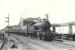 V1 67661 at Camlachie on 1 May 1958 with a Hyndland - Shettleston train, with PW work taking place in the goods yard on the left. [See image 50798]  <br><br>[G H Robin collection by courtesy of the Mitchell Library, Glasgow 01/05/1958]