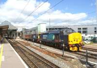 DRS locos often appear in pairs and this ecs move on 15 July 2015 from Carlisle to Crewe was no exception. Pure EE traction in this case with a Class 37 and Class 20 passing Preston.<br><br>[John McIntyre 15/07/2015]