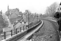 View from a railtour in 1974 crossing the viaduct to the west of Dunfermline Upper station.  The masonry on the left was repaired following a freight train derailment when the line was still double track. The road below is Buffies Brae.<br><br>[Bill Roberton //1974]