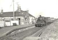 BR standard Mogul 77017 arriving at Hollybush station on 28 March 1959 with a train from Dalmellington heading for Ayr. <br><br>[G H Robin collection by courtesy of the Mitchell Library, Glasgow 28/03/1959]