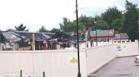 The severely fire damaged Ballater station on 28 July 2015. The whole site is currently secured behind a wooden hoarding awaiting further developments [see image 5779].<br><br>[Andy Furnevel 28/07/2015]