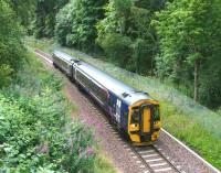 A 158 Borders Railway crew training trip approaching Kings Gate points on 24 July 2015 at the northern end of the single line section from Fushiebridge.<br><br>[John Furnevel 24/07/2015]