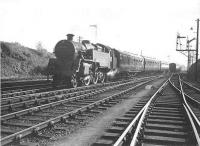 BR standard 2-6-4 tank 80005 photographed at Maud in the spring of 1959 in the process of dividing the Fraserburgh and Peterhead portions of a recent arrival from Aberdeen. <br><br>[G H Robin collection by courtesy of the Mitchell Library, Glasgow 15/05/1959]