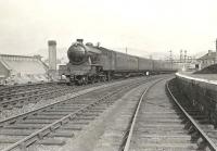 V3 67689 approaching Dumbarton Central on 7 August 1957 with a Bridgeton - Balloch train.<br><br>[G H Robin collection by courtesy of the Mitchell Library, Glasgow 07/08/1957]