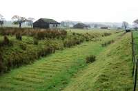 Remains of RNAD Leadburn looking towards Lamancha in October 2004. Sleeper indentations remain prominent along the length of the trackbed.<br><br>[Ewan Crawford 30/10/2004]