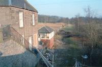 The former station at Auldbar Road, near Guthrie, Angus, looking east towards Guthrie Junction in 1996. The platforms were situated behind the camera and the signalbox and goods yard are seen here.<br><br>[Ewan Crawford //1996]