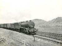 Gresley K2 2-6-0 no 61779 takes an up goods from Fraserburgh past Kirkton on 7 August 1954. At this point the main line to Aberdeen is running parallel with the St Combs branch on the other side of the fence.<br><br>[G H Robin collection by courtesy of the Mitchell Library, Glasgow 07/08/1954]