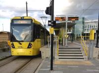 Metrolink Tram 3036 gets ready to return to Manchester from Rochdale on 18th July 2015. This new tram terminus is approximately at right angles to the station.<br><br>[Ken Strachan 18/07/2015]