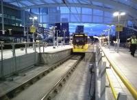 A Saturday evening tram for Rochdale prepares to leave Manchester Victoria station on 18 July. A much tidier view than a few months ago [see image 49303].<br><br>[Ken Strachan 18/07/2015]