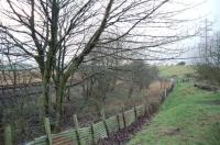 The site of Lyoncross Junction looking west in 1998. The line on the left beyond the trees is the Lanarkshire and Ayrshire route towards Neilston, with the trackbed on the right the remnants of the Paisley and Barrhead District Railway. <br><br>[Ewan Crawford //1998]