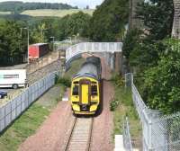 158729 about to pass below the footbridge on low Buckholmside shortly after leaving Galashiels station on a driver training trip returning to Newcraighall on 12 August.<br><br>[John Furnevel 12/08/2015]