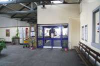 The booking office and waiting area at Thurso on 28 August 2007, with a 158 for Inverness waiting at the platform.<br><br>[John Furnevel 28/08/2007]