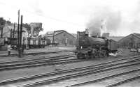 Grab shot from a train leaving Inverness in 1959, with B1 and Black 5 locomotives visible in the shed yard. <br><br>[D Walker Collection [Courtesy Bruce McCartney] //1959]