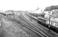 View south at Carstairs in 1981 with a Glasgow Central - London Euston service passing through. Note the old locomotive shed has been demolished [see image 1189]. Note also the APT speed limit sign bottom right. <br><br>[John Furnevel 13/09/1981]