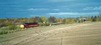 In 2000, 37415 stops to reverse a PW train into the up yard. It is paused between Millerhill South Junction on the Monktonhall curve and Millerhill Junction on the former mainline.<br><br>[Ewan Crawford //2000]